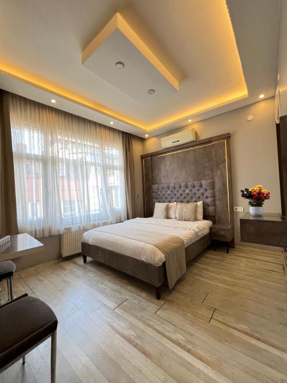 Postel nebo postele na pokoji v ubytování taksim brand suit hotel
