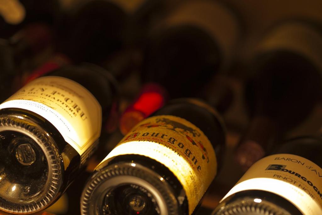 two opened wine bottles sitting next to each other at Hotel Amsterdam Huis Ten Bosch in Sasebo