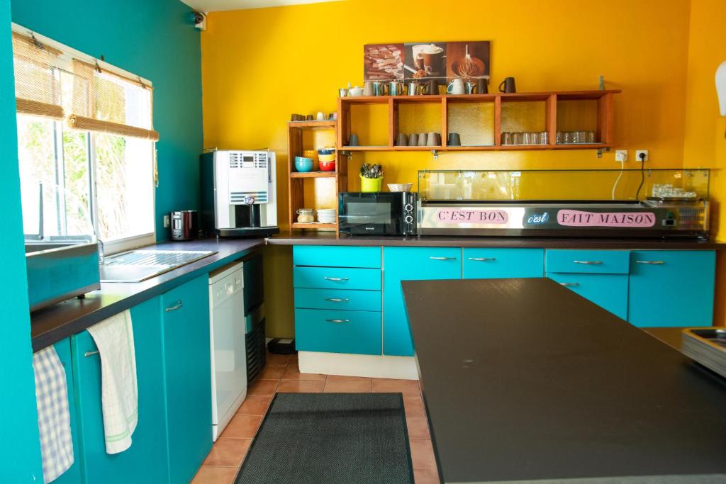 Kuchyň nebo kuchyňský kout v ubytování Hotel Ylang Ylang
