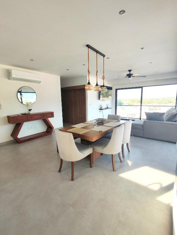 TV a/nebo společenská místnost v ubytování Mountain View Luxury Condo I Céntrico