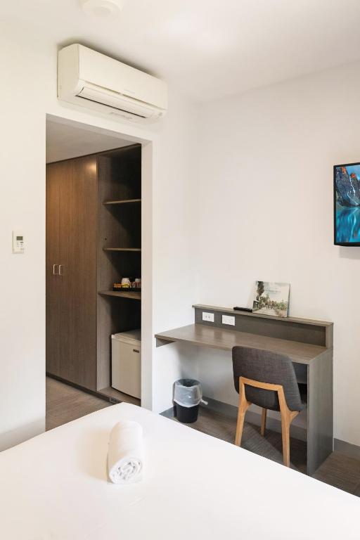 Postel nebo postele na pokoji v ubytování Ibis Darwin Airport Hotel