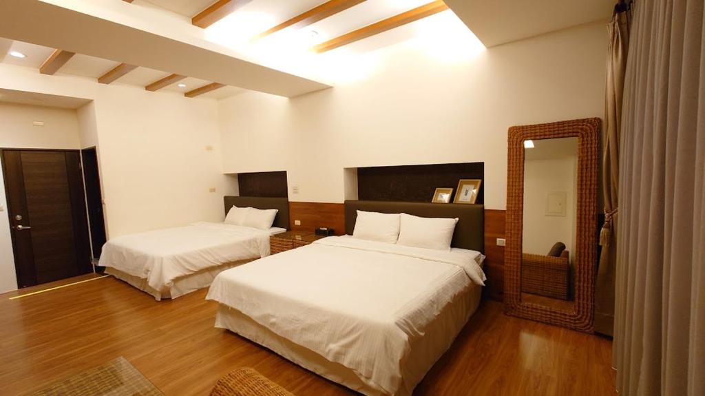 Postel nebo postele na pokoji v ubytování Corner Hostel