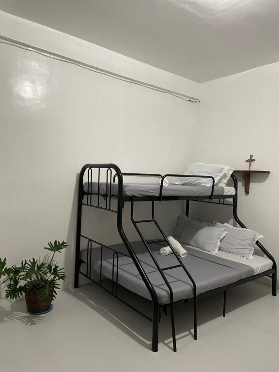 Postel nebo postele na pokoji v ubytování Noguerra Homestay