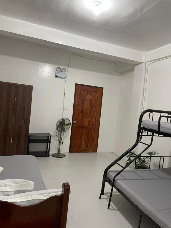 Postel nebo postele na pokoji v ubytování Noguerra Homestay