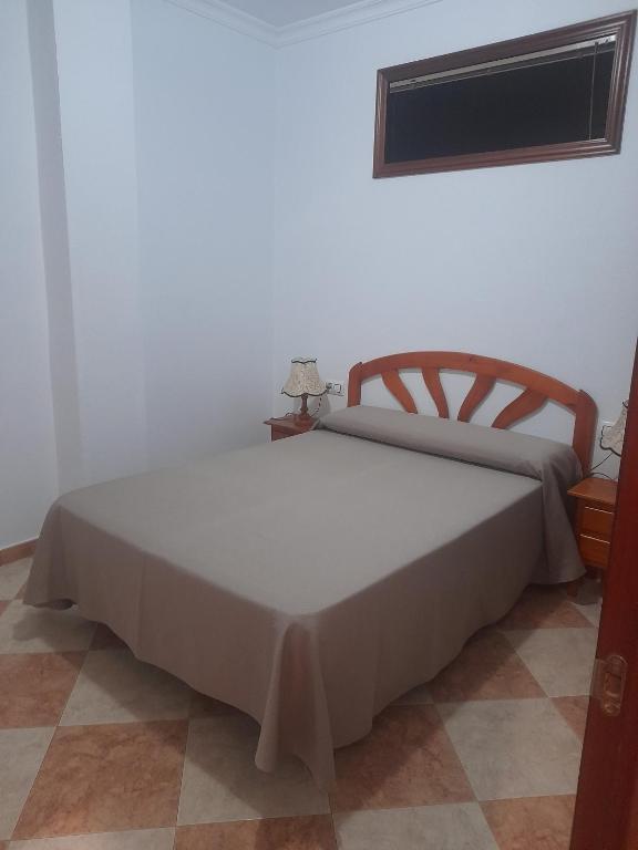 Postel nebo postele na pokoji v ubytování Hostal Casandra - antiguo Hostal Los Valencianos