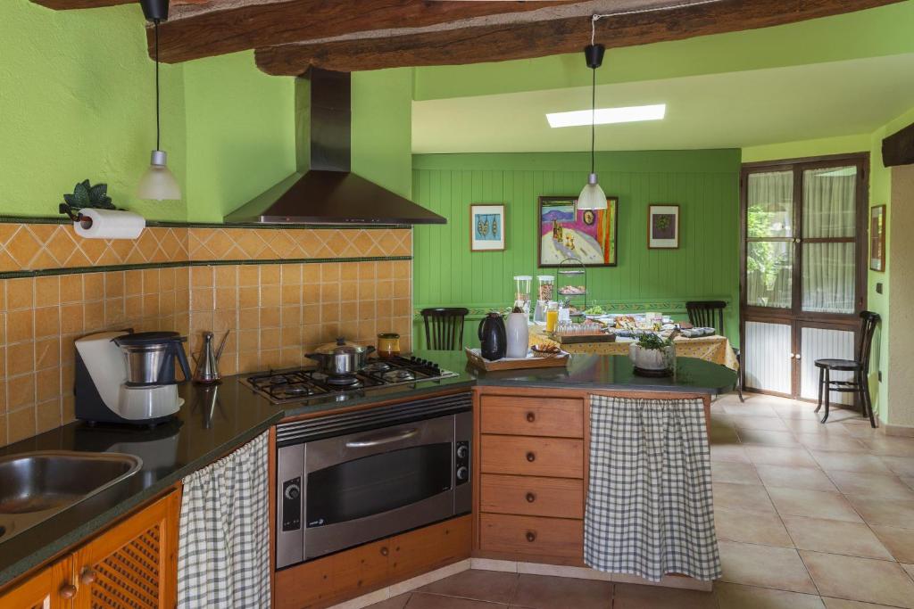 Kuchyň nebo kuchyňský kout v ubytování Casa Rural Can Coll
