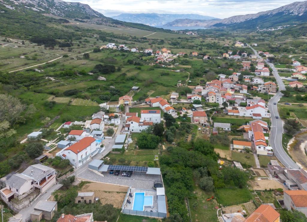 an aerial view of a small town in the mountains at Relax House Rosemary in Draga Bašćanska