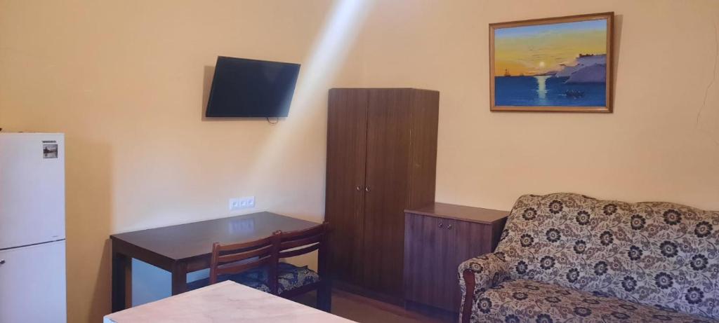 TV a/nebo společenská místnost v ubytování Family