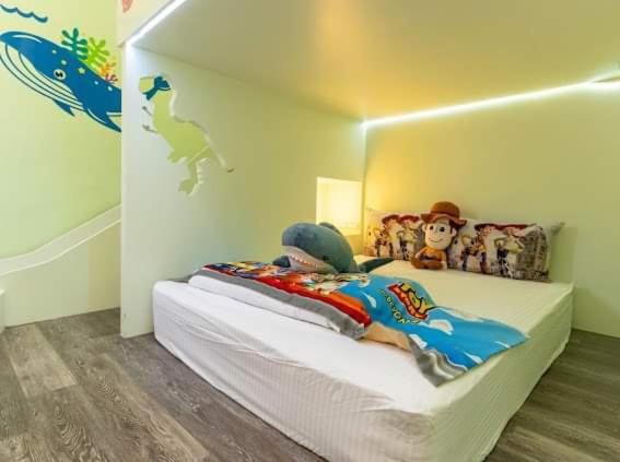 Postel nebo postele na pokoji v ubytování Haoyue Tongxin Family Homestay