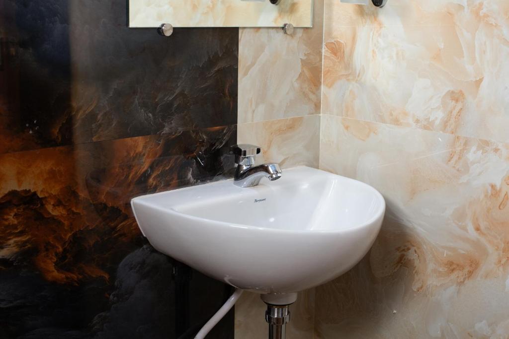 Fotografie z fotogalerie ubytování MUGUNDAN 'S SMART STAY v destinaci Kójamputtúr