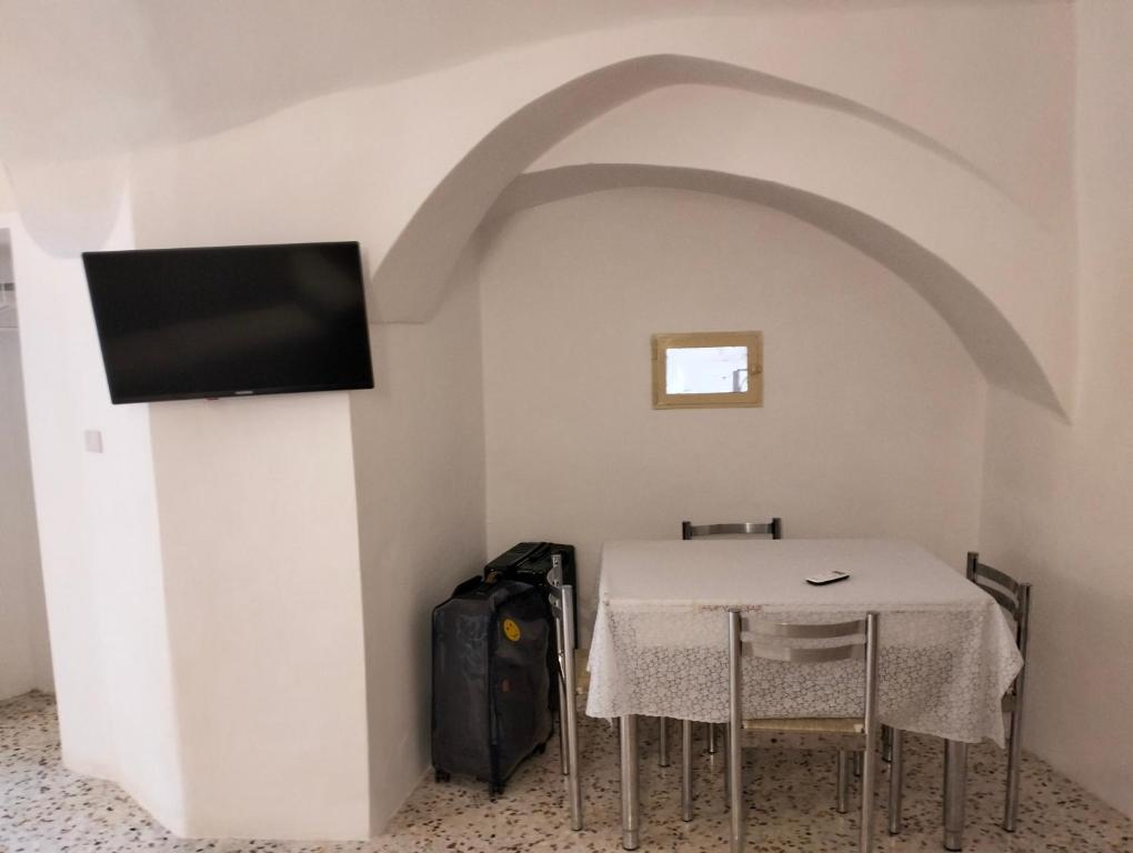 Telewizja i/lub zestaw kina domowego w obiekcie Stone Rooms