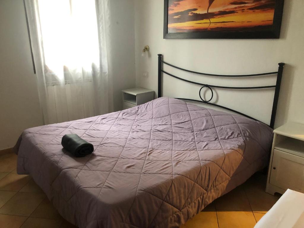 Postel nebo postele na pokoji v ubytování Il Cortile del Contadino
