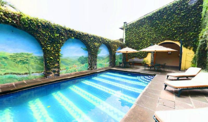 The swimming pool at or close to Posada Coatepec