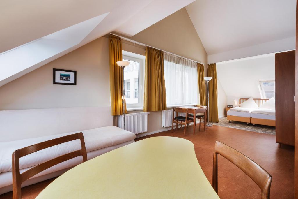 Postel nebo postele na pokoji v ubytování Klassik Appartements