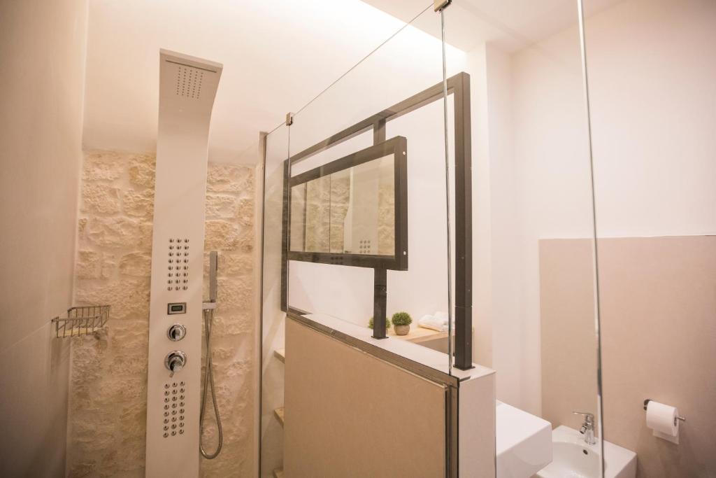 Koupelna v ubytování Albergo Diffuso Dimora Rossi Suite B&B