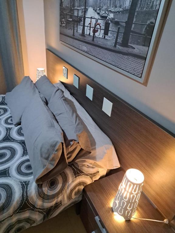 Łóżko lub łóżka w pokoju w obiekcie Apartamento Eursu Playa