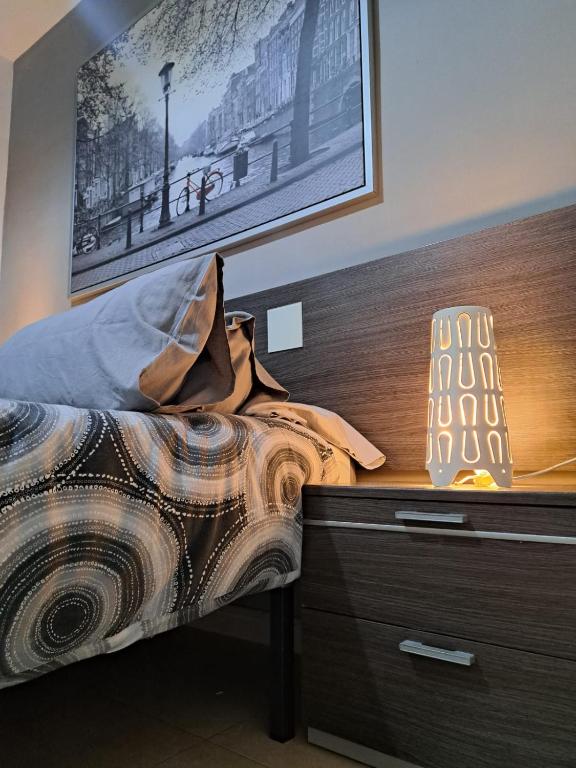 Łóżko lub łóżka w pokoju w obiekcie Apartamento Eursu Playa