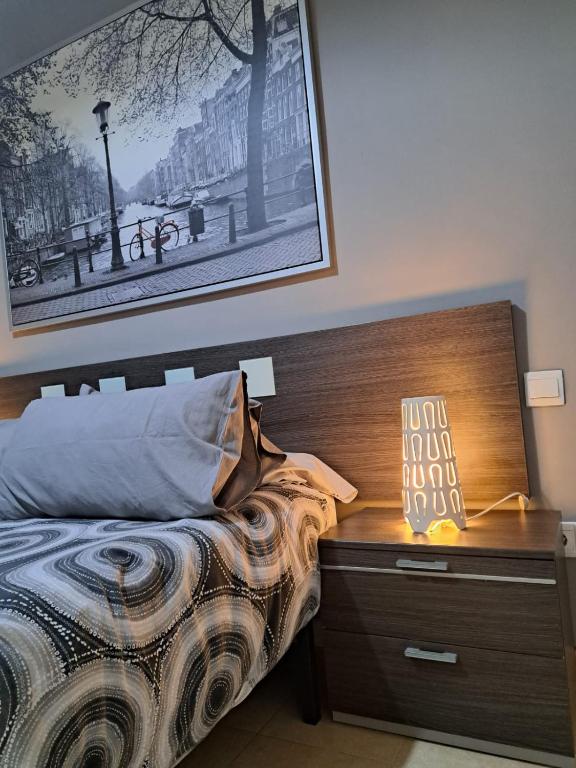 Łóżko lub łóżka w pokoju w obiekcie Apartamento Eursu Playa