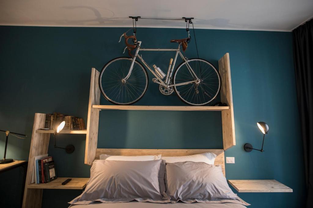 Postel nebo postele na pokoji v ubytování Albergo Diffuso Dimora Rossi Suite B&B