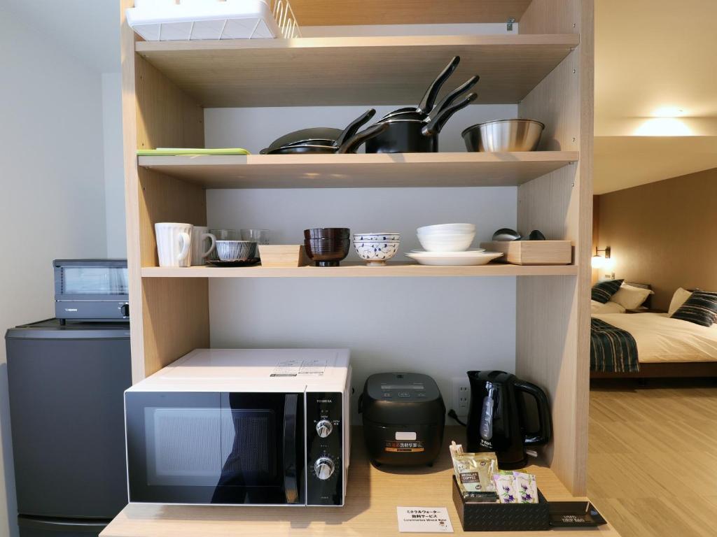 Kuchyň nebo kuchyňský kout v ubytování Hotel Ichibokaku