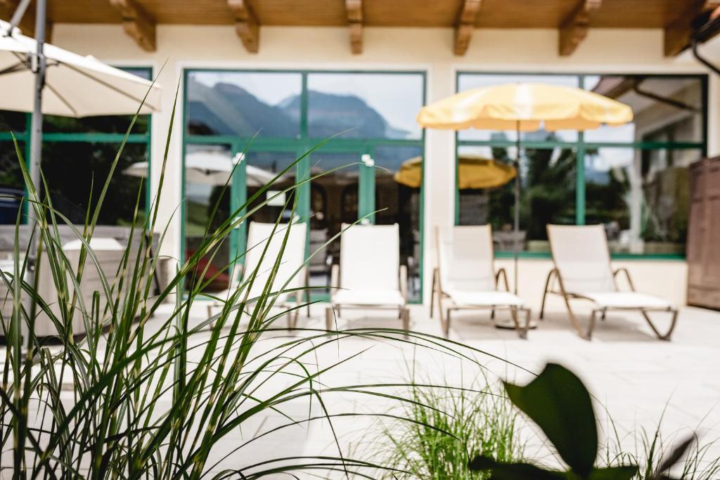 A patio or other outdoor area at Hotel Post Abtenau