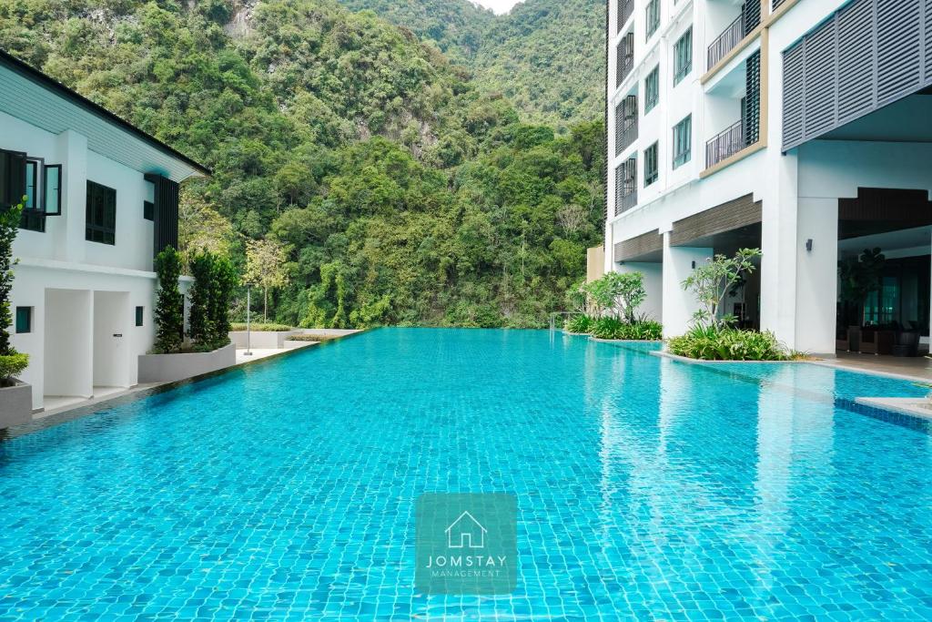 Bazén v ubytování JOMSTAY Sunway Onsen Suites Ipoh - Lost World of Tambun Ipoh Waterpark nebo v jeho okolí