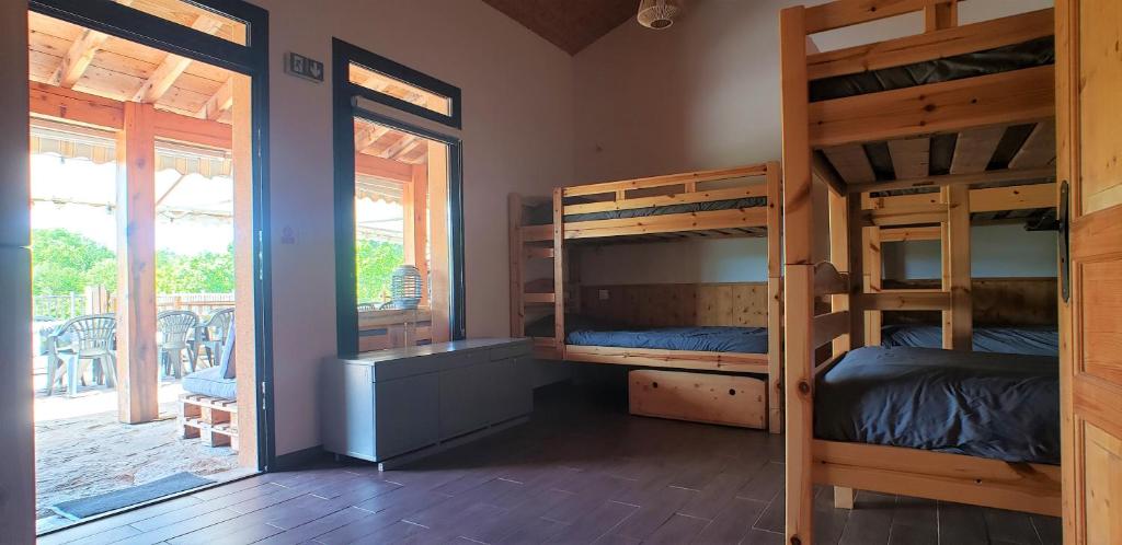Postel nebo postele na pokoji v ubytování Gîte de Cayssie