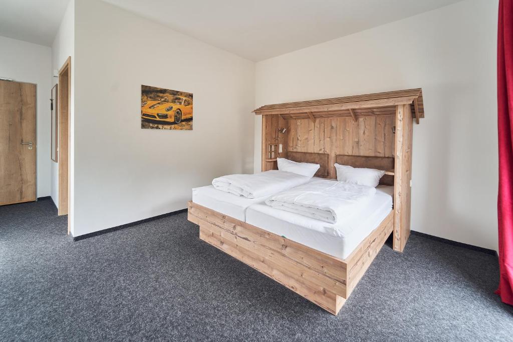 Postel nebo postele na pokoji v ubytování Hotel am Interpark