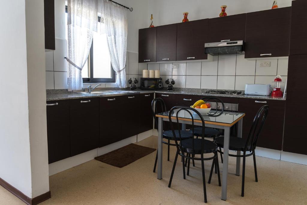 Kuchyň nebo kuchyňský kout v ubytování Villa Sunview