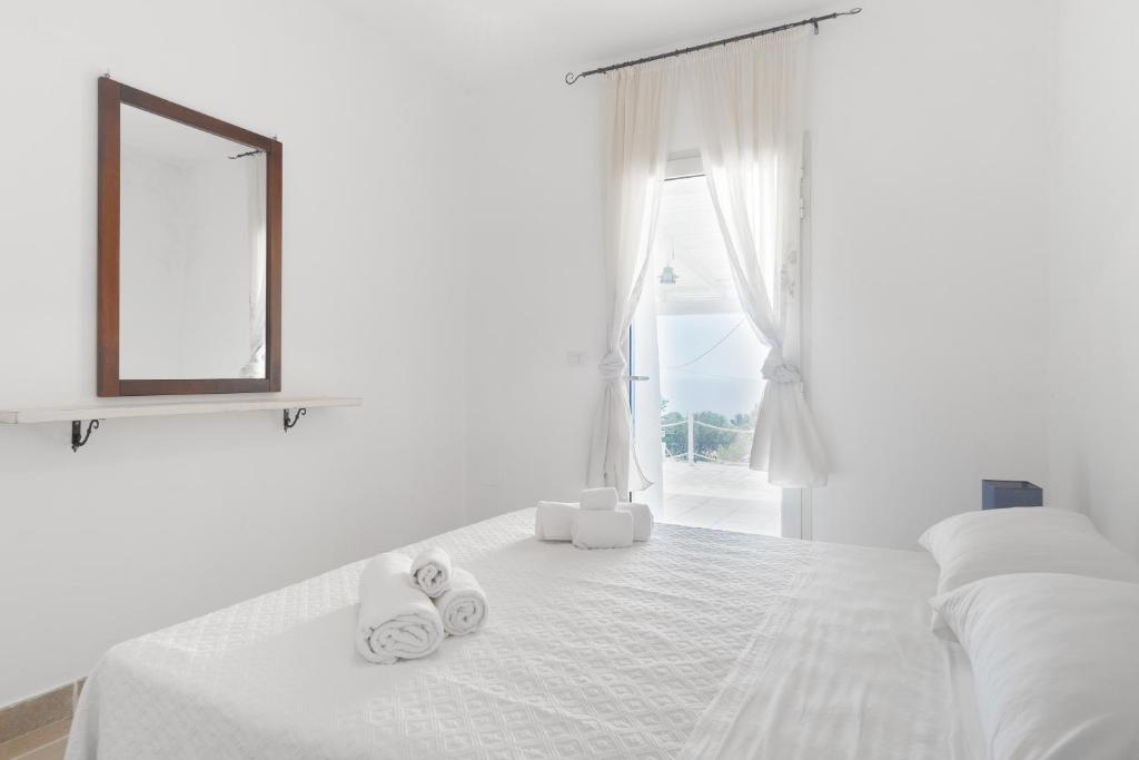 Кровать или кровати в номере Villette Finibusterrae