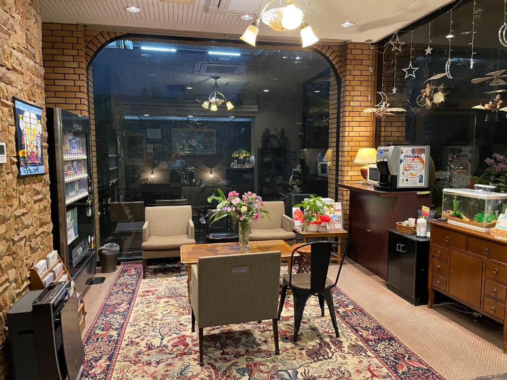 Posezení v ubytování Kiryu Ace Hotel