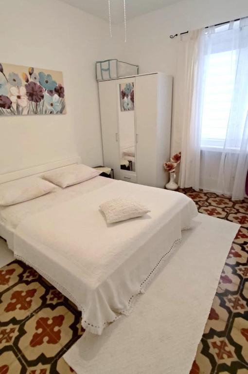 Postel nebo postele na pokoji v ubytování Apartment Mamma Mia 2