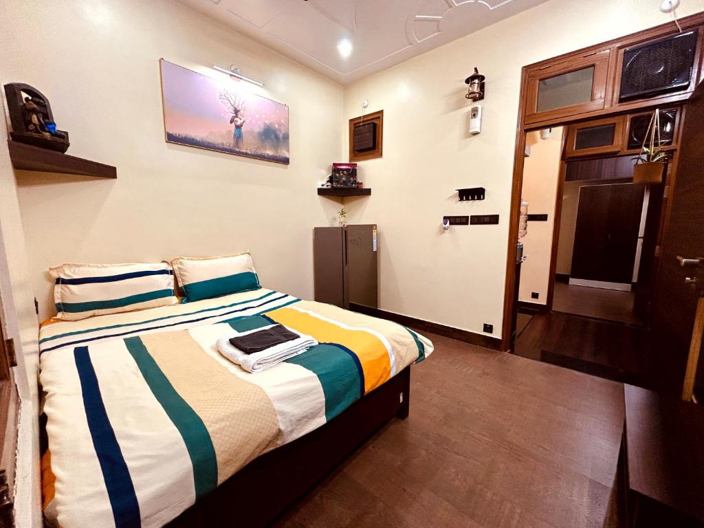 a bedroom with a bed in a room at Sumptuous 1BHk Couple friendly in Lucknow