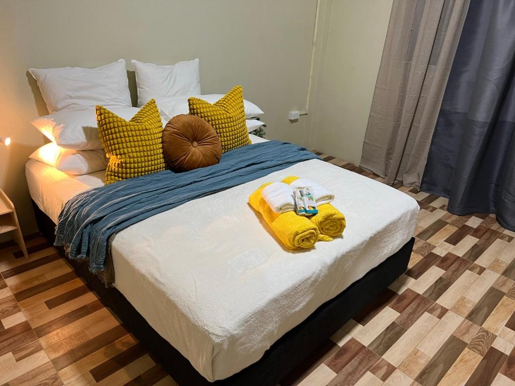 Postel nebo postele na pokoji v ubytování “Marley’s Home“