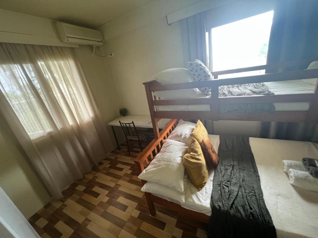 Postel nebo postele na pokoji v ubytování “Marley’s Home“