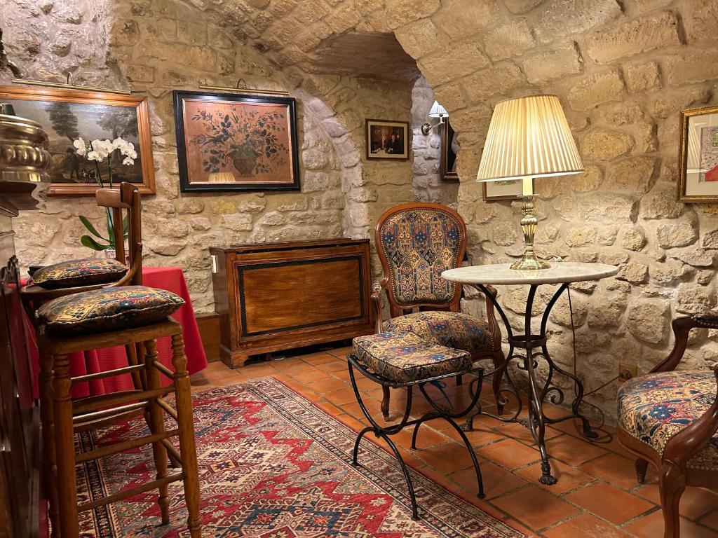 Posezení v ubytování Hôtel Duc De St-Simon