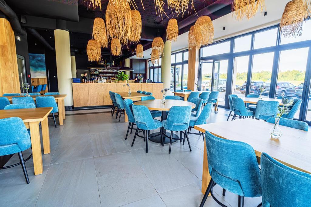 Reštaurácia alebo iné gastronomické zariadenie v ubytovaní Horyzont Apartamenty -Polanki AQUA- Strefa SPA z basenem i fitness studio, prywatny garaż