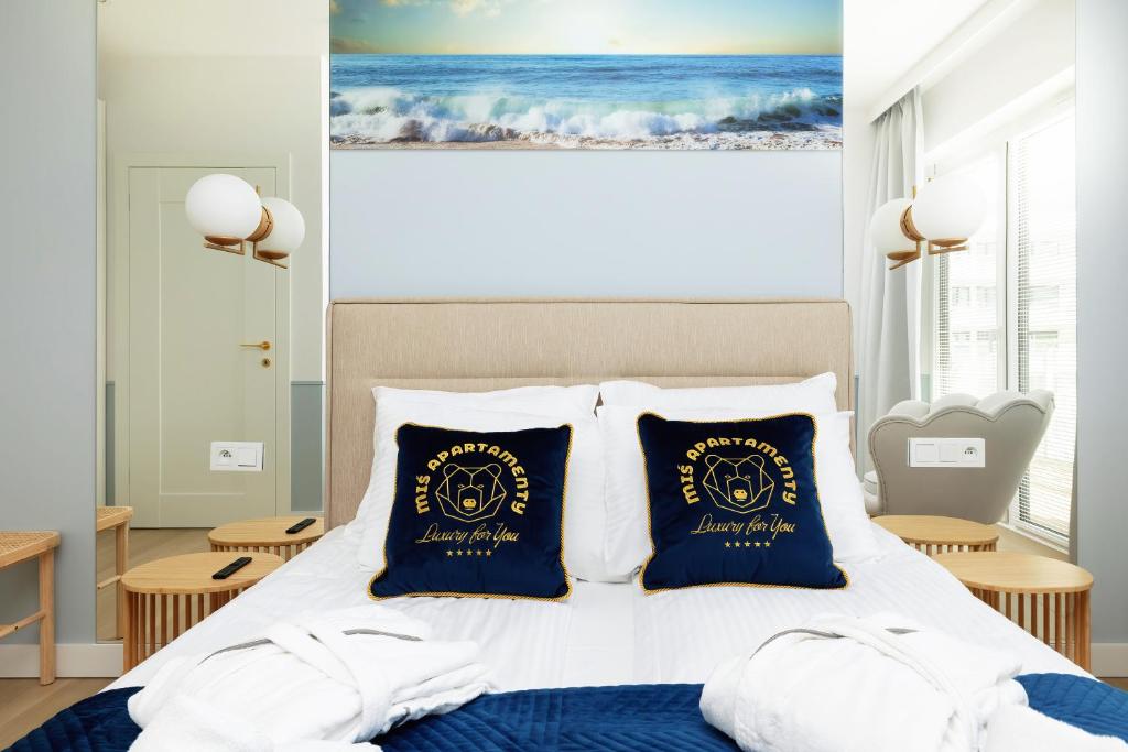 Posteľ alebo postele v izbe v ubytovaní Horyzont Apartamenty -Polanki AQUA- Strefa SPA z basenem i fitness studio, prywatny garaż