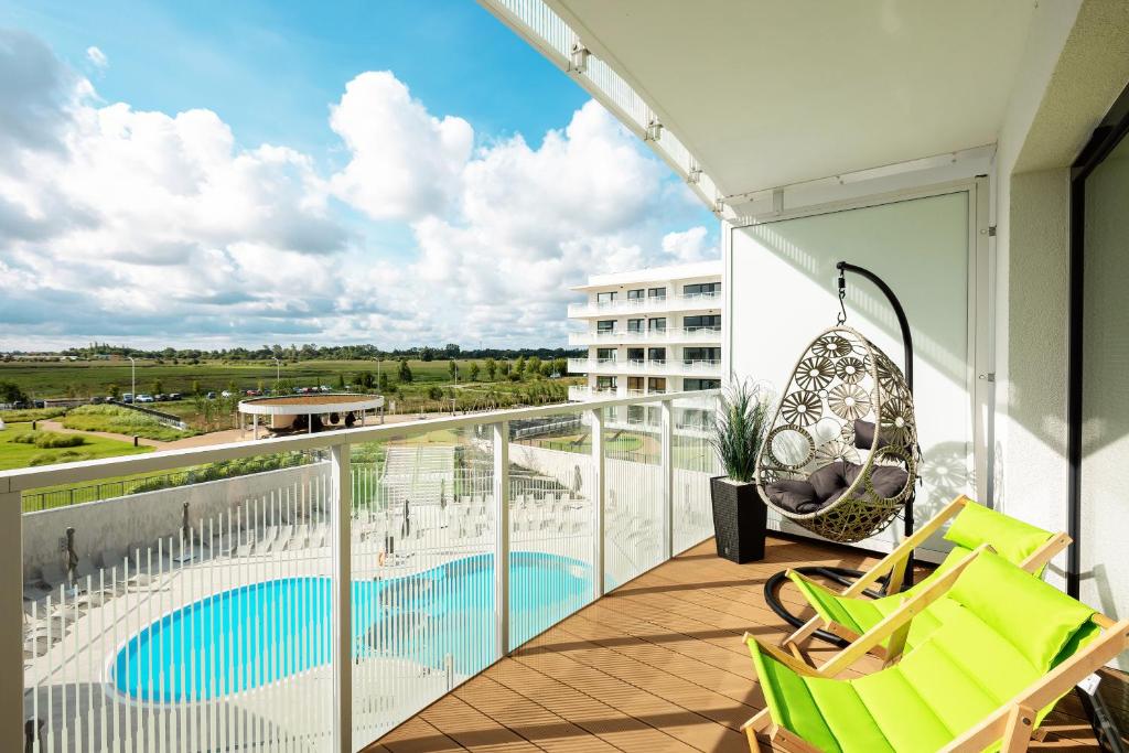 Bazén v ubytovaní Horyzont Apartamenty -Polanki AQUA- Strefa SPA z basenem i fitness studio, prywatny garaż alebo v jeho blízkosti