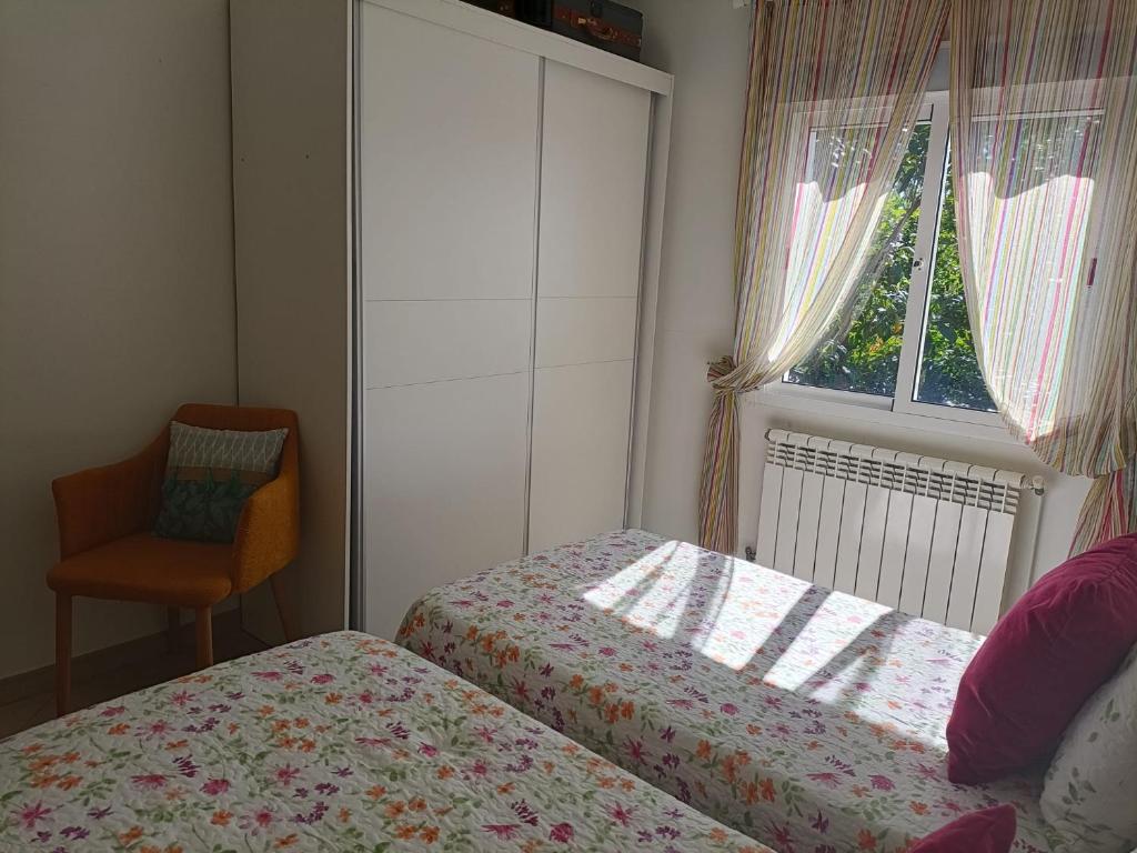 Łóżko lub łóżka w pokoju w obiekcie Casa de campo tranquila en vilar cerca de santiago