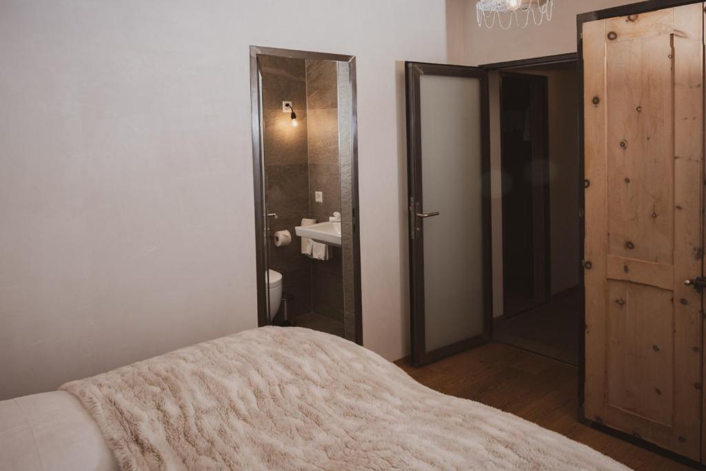Postel nebo postele na pokoji v ubytování Backstage Hotel Serviced Apartments