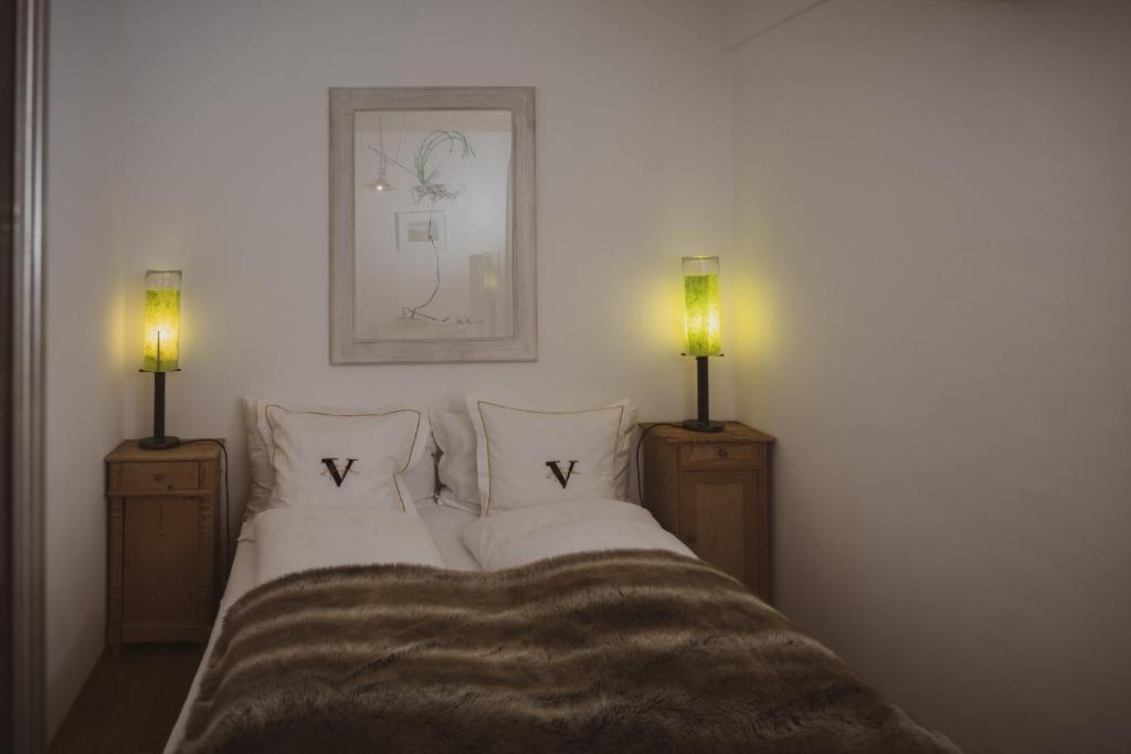 Postel nebo postele na pokoji v ubytování Backstage Hotel Serviced Apartments