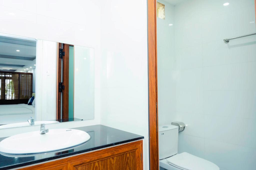 Koupelna v ubytování HỒ MÂY PARK Vũng Tàu Khách Sạn - Resort