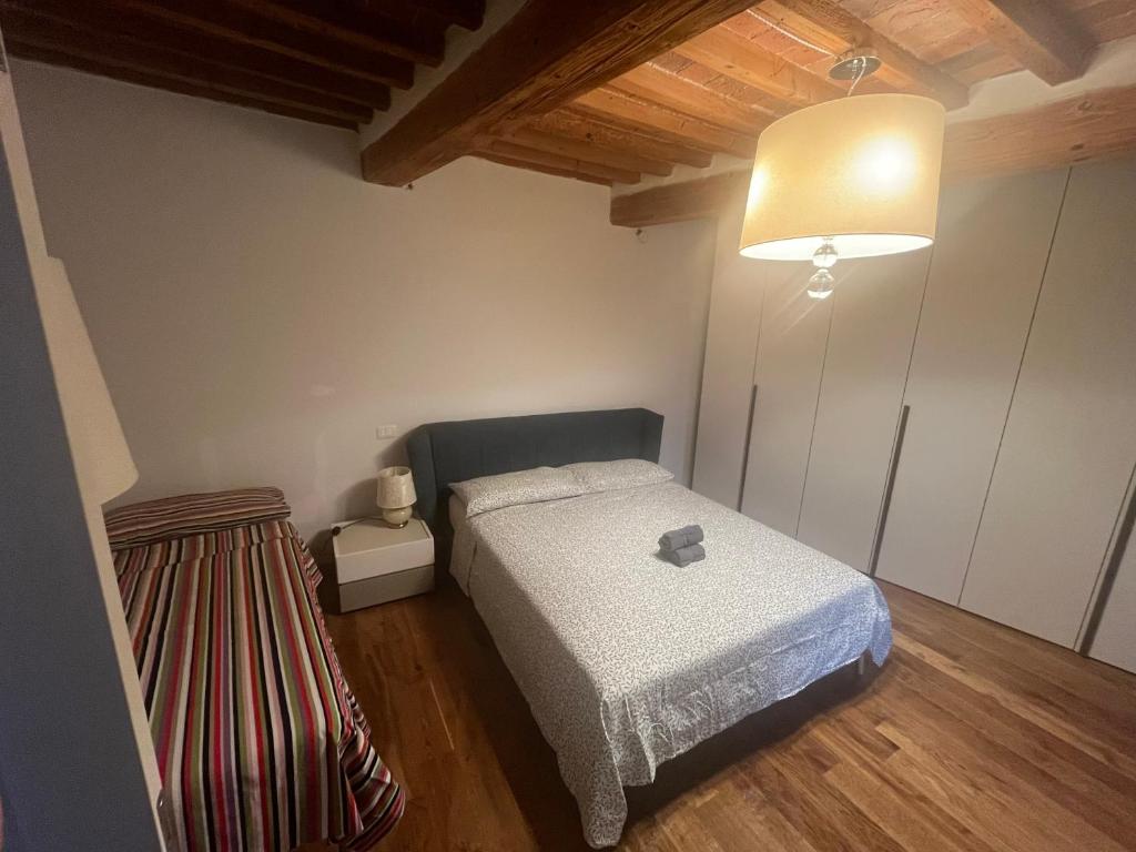 Postel nebo postele na pokoji v ubytování Villa Rosa