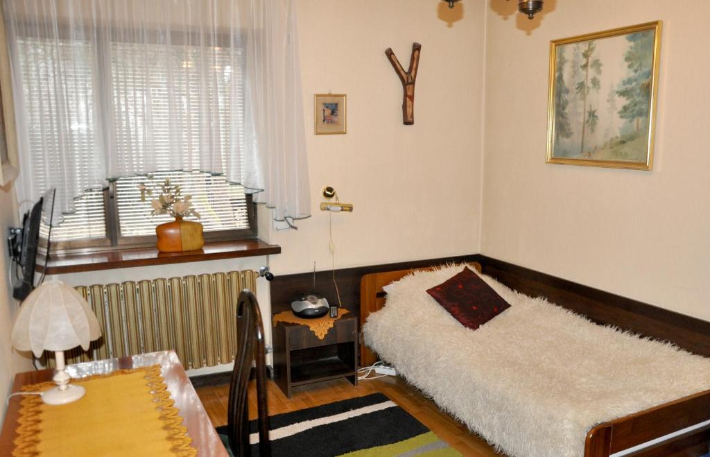 Posteľ alebo postele v izbe v ubytovaní Pokoje Gościnne pod Sikornikiem