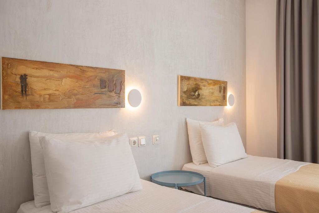 Postel nebo postele na pokoji v ubytování Zefyros Sea View Hotel