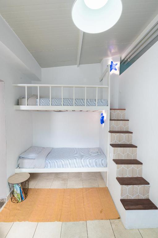 Posteľ alebo postele v izbe v ubytovaní Lemon Tree Family House