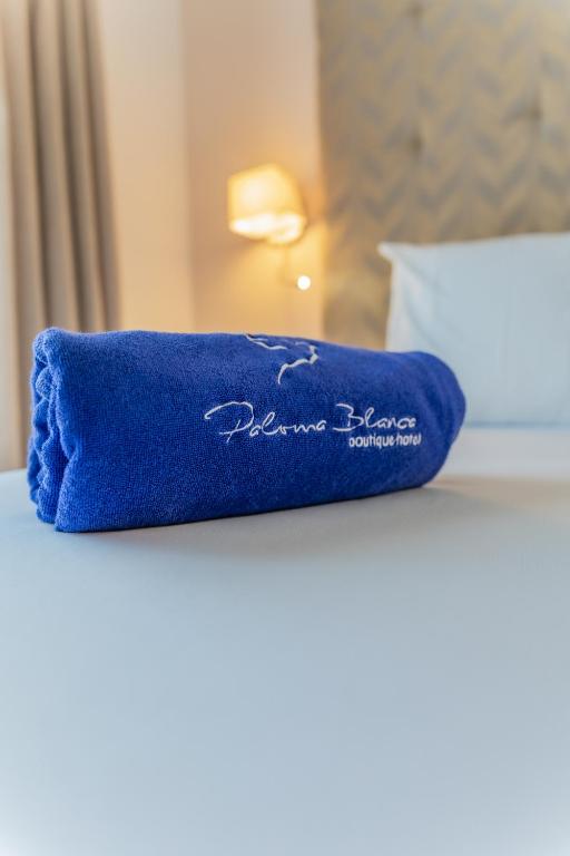 Posteľ alebo postele v izbe v ubytovaní Paloma Blanca Boutique Hotel