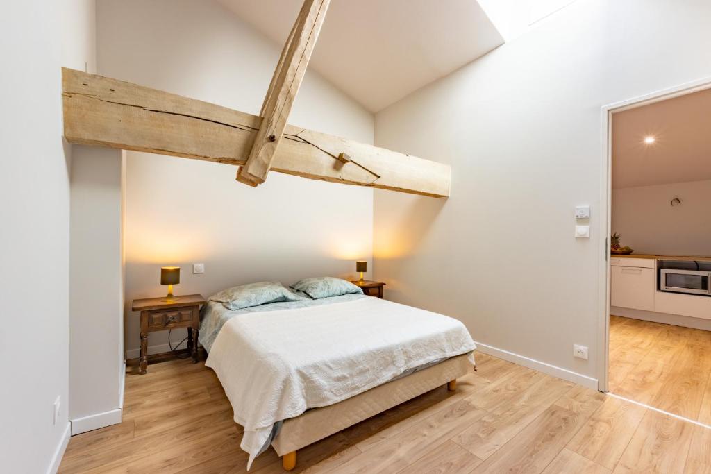 Postel nebo postele na pokoji v ubytování Ô DOMAINE DU ROUSSILLON