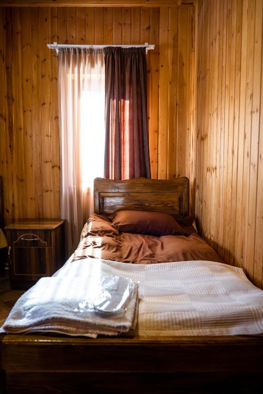 Postel nebo postele na pokoji v ubytování Guesthouse Ushguli Maspindzeli